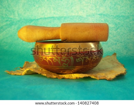 Tibetan singing bowl for meditation with wooden mallet