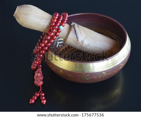 Singing Bowl with prayer beads