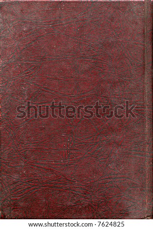 Red, heavily lined faux-leather from a book-cover spotted with white, suitable for use as a background texture.