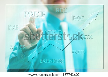 Businessman Showing Stock Glossary And Rising Arrow in Transparent Screen