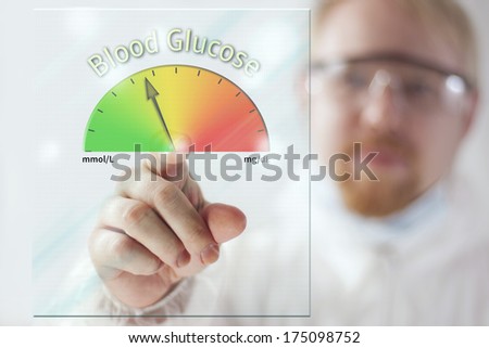 Physician Showing Blood Glucose Meter at Screen