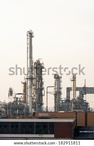 Columns of Oil Refinery at Hazy Day