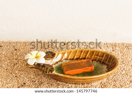 soap and ceramic soap-box on cement floor