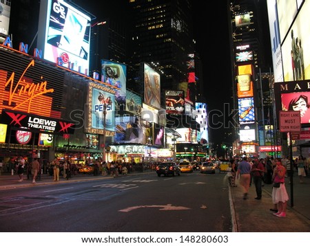 New York City - Sep 29: Lights And Advertisements Of Times Square At Night, September 29, 2006 In New York City. Times Square Is A Major Center Of The World\'S Entertainment Industry