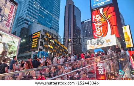 NEW YORK CITY - MAY 20: Tourists relaxing in Duffy Square, May 20, 2013 in New York. The square is part of Times SquareÃ?Â¢??s dramatic transformation over the last 10 years.