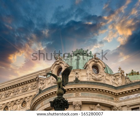 Paris, l\'Opera. Opera magnificent building seen at sunset.