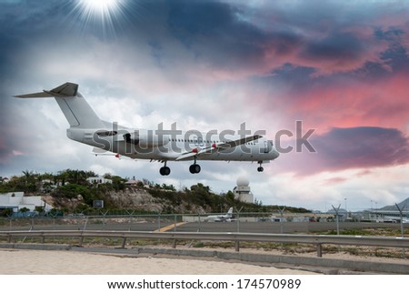 Airplane landing in St. Maarten Island, Dutch Antilles.