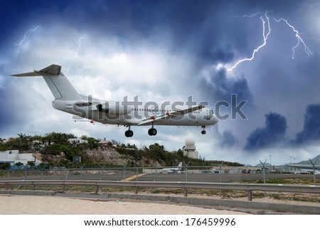 Airplane landing in the storm.