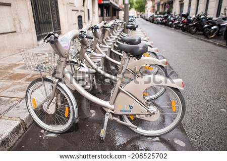 PARIS, FRANCE - JUNE 19: Some bicycles of the Velib bike rental service in Paris, France on June 19, 2014. With the bicing sharing service people can rent bicycles for short trips