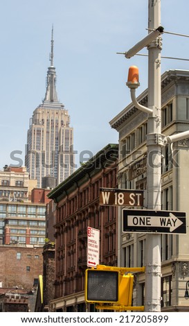 NEW YORK CITY - MAY 26 : Empire state building view from street level, May 26, 2013 in New York City. It stood as the world\'s tallest building for more than 40 years (from 1931 to 1972)