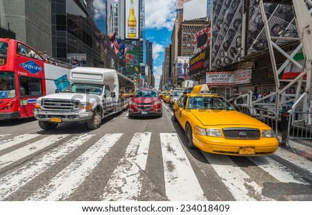 NEW YORK - MAY 11: Taxicabs along Manhattan avenues. Licensed by the New York City Taxi and Limousine Commission, there are over 40.000 vehicles, on May 11, 2013 in New York City. USA