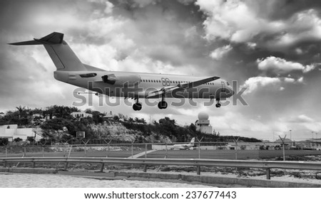 Airplane landing in St. Maarten Island, Dutch Antilles.