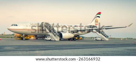 MALE, MALDIVES - FEBRUARY 10, 2015: Etihad Airbus 330 ready to take off. Etihad is the flag carrier airline of the United Arab Emirates with its headquarters in Abu Dhabi.