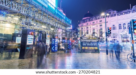 LONDON - AUGUST 22, 2013: Regent Street at night. It was named after Prince Regent, completed in 1825. Every building in Regent Street is protected as a Listed Building