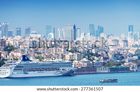 ISTANBUL - SEPTEMBER 16, 2014: Cruise ship anchored in city port. Istanbul is a favourite destination for cruise lines.