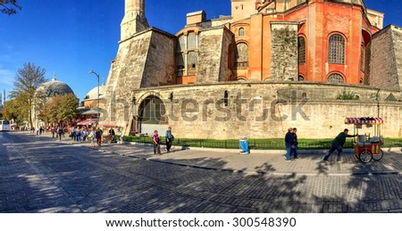 ISTANBUL - SEPTEMBER 21, 2014: Tourists visit Hagia Sophia. More than 10 million people visit Istanbul every year.
