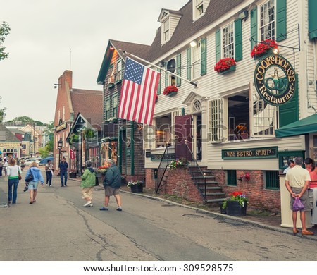NEWPORT, RI - JULY 10, 2008: Tourists in city streets. Newport typically brings in $700 million in tourism dollars every year.