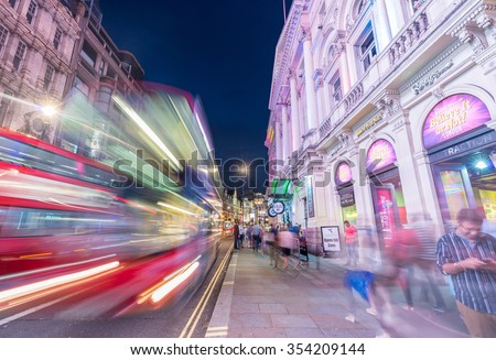 LONDON - JUNE 16, 2015: Traffic in Piccadilly Circus area. Piccadilly signs have become a major attraction of London.