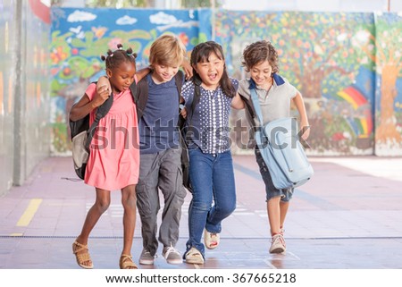 Multi ethnic group of children playing together. Success and integration concept.
