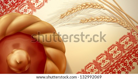 Cake and ears of wheat from a bakery in the towel