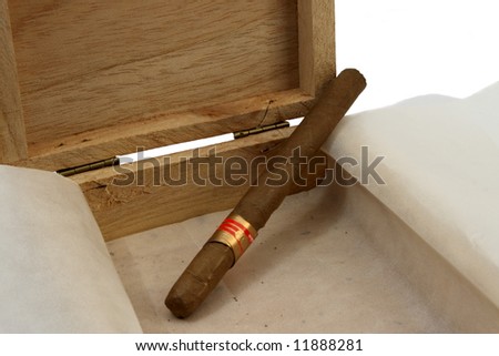 left last cigar on brown wooden box