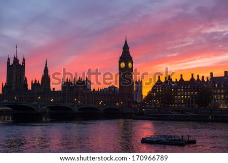 purple sunset in London behind the river Thames, Big Ben and Houses of Parliament