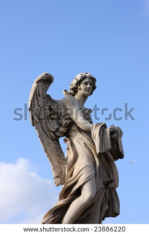 stock photo famous Bernini angel sculpture on San Angelo bridge in Rome 