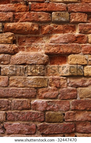 old cracked rough red bricks texture