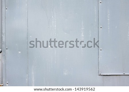 riveted gray steel background with space for text