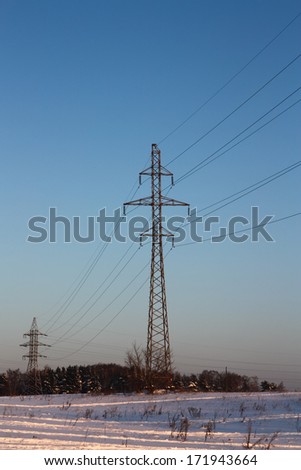 The photo shows the supports of power lines.