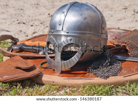 Viking weaponry. Sword, shield and helmet at a historical reenactment festival held in Abalak, Siberia. Russia.