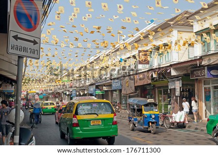BANGKOK, THAILAND DEC 7:On the street near Khaosan Road. Street is decorated with many Thai flags on Dec 7, 2013. Bangkok occupies 1,568.7 square kilometers, and has a population of over eight million