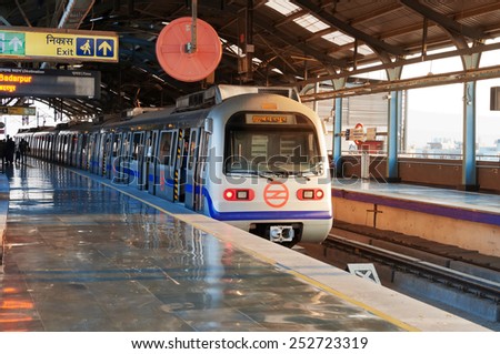 NEW DELHI, INDIA, DEC - 5, 2014: Delhi Metro station. Delhi Metro is the network consists of five colour-coded lines (Red, Blue, Green, Yellow, Violet), plus a sixth Airport Express line