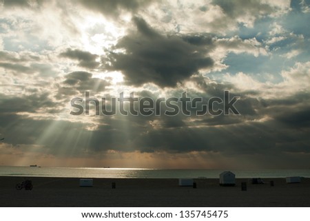 Sun-break at South Beach Sun as it breaks through the clouds on a cloudy morning in South Beach, Miami Florida