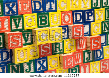 A bunch of letter blocks with the word success pushed out