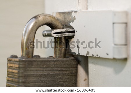 Closeup view of a lock keeping a door closed