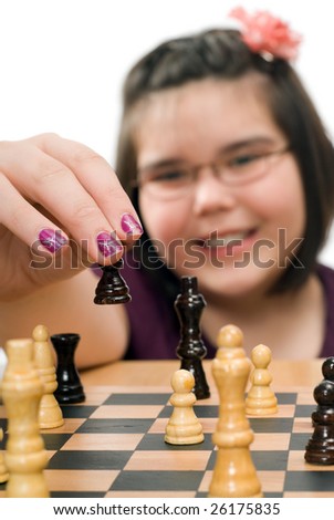 Closeup view of a young girl playing in a chess tournament