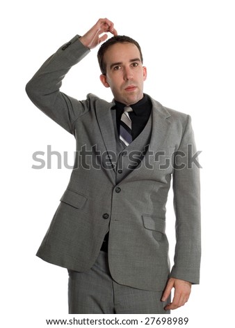 A young businessman tapping his head using EFT, as a new method to improve physical and mental conditions, isolated against a white background