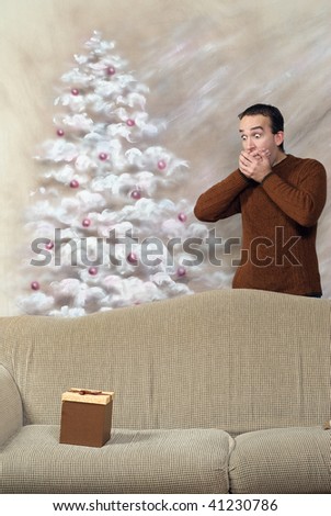 A young man is covering his mouth is shock and surprise that there is a gift on the sofa for him