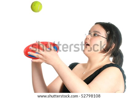 stock photo Young preteen girl playing catch with a Hook and Loop Fastener 