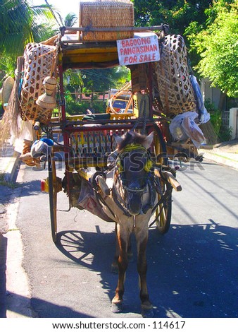 (In the Philippines) Household items sold \'round the street in a horse carriage.