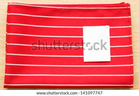 red and white napkin on the desk