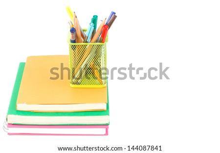 Pile of textbooks, tools in a support and isolated white background