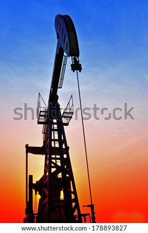 Oil pump in the orange sunset, taken in the luanhe river south excrementum bombycis mouth, in the north of China