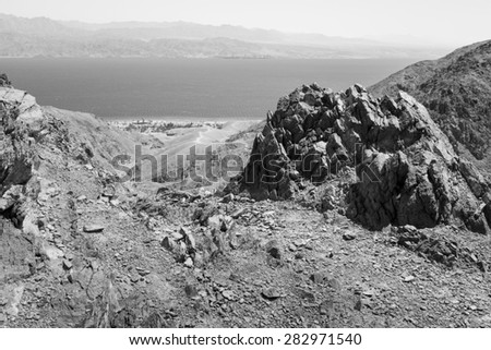 Black and white Red sea mountains and Eilat  Aqaba city view, Israel.