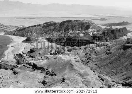 Black and white stone desert mountains cliffs, Arava, Negev desert, Israel.