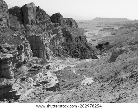 Black and white stone desert mountains cliffs, Arava, Negev desert, Israel.