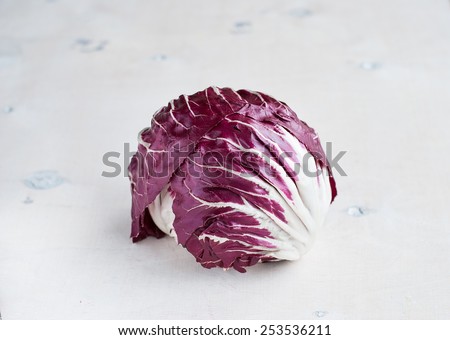 Radicchio red salad on white wooden background