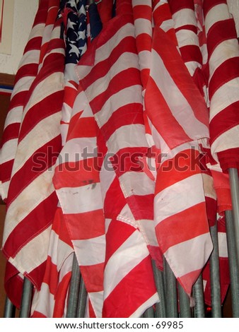 Dirty, abused, old American flags.