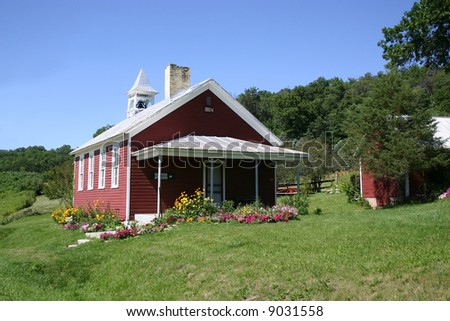 An old red country one room school house